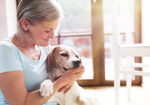 woman with dog | Ultimate Pet Nutrition