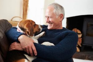 senior with dog | Ultimate Pet Nutrition